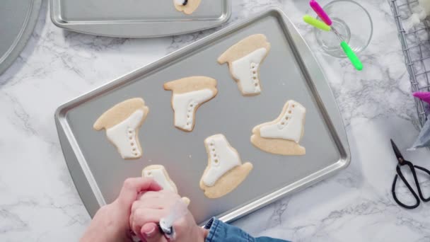 Flat Lay Decorating Sugar Cookies Shaped Figure Skates Royal Icing — Stock Video