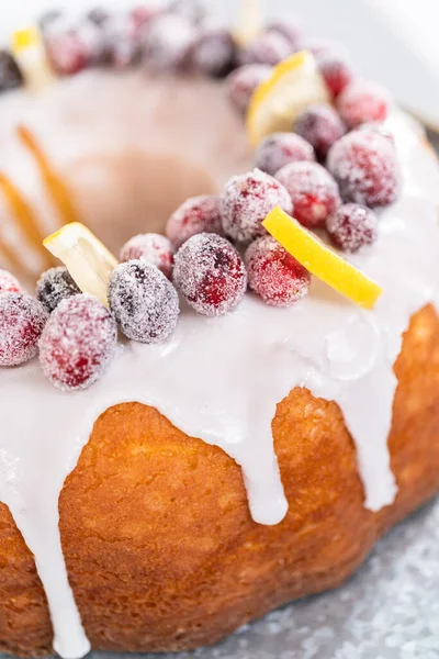 Lemon Cranberry Bundt Cake Decorated Sugar Cranberries Lemon Wedges Cake — Stock Photo, Image