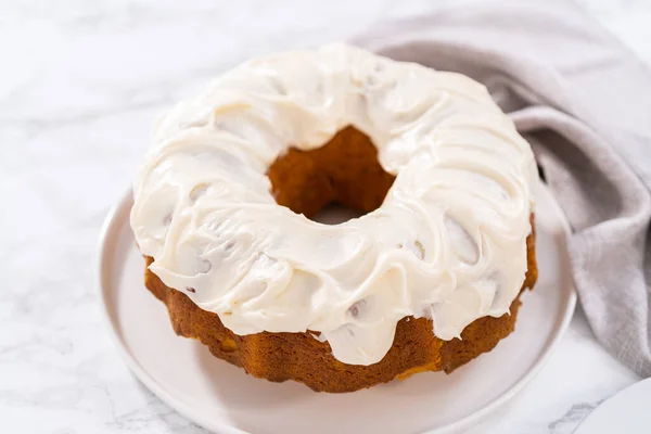 Freshly Baked Pumpkin Bunt Cake Cream Cheese Frosting Kitchen Counter — Stock Photo, Image
