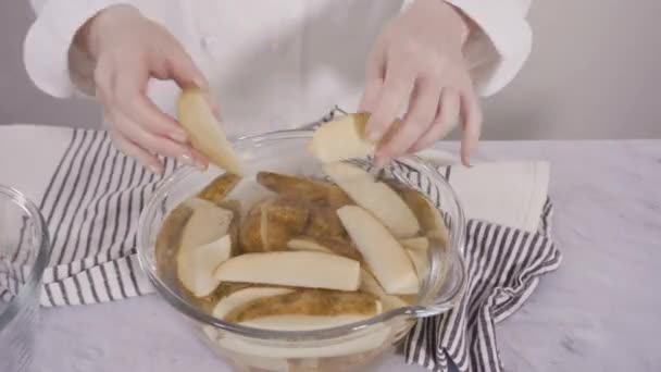 Preparing Russet Potatoes Wedges Olive Oil Spices Bake Oven — Stock Video