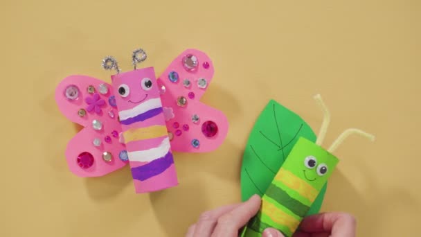 Kids Papercraft Making Paper Bugs Out Empty Toilet Paper Rolls — Stock Video