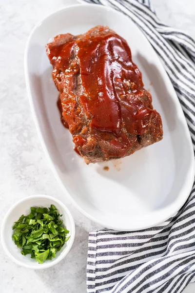 Slicing Classic Meatloaf Sweet Glaze White Serving Plate — Stock Photo, Image