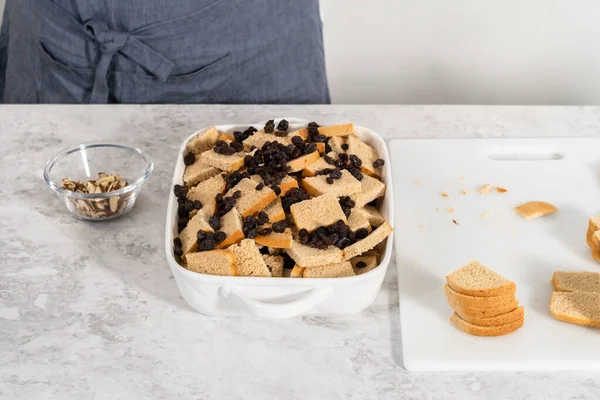 Baking Bread Pudding Raising Almond Slivers White Casserole Dish — Stock Photo, Image