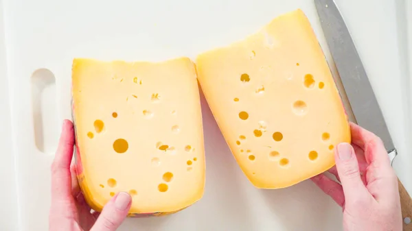 Flat Lay Slicing Large Slice Gourmet Cheese White Background — Stock Photo, Image