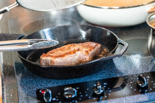 Frying New York Strip Steak Cast Iron Frying Pan Electric — Stock Photo, Image