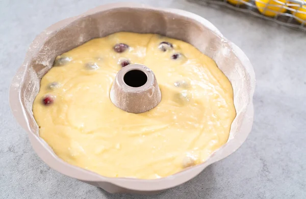 Cake batter in bundt cake pan ready for baking.