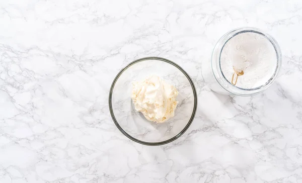 Flat Lay Mixing Store Bought Buttercream Frosting Glass Mixing Bowl — Stock Photo, Image