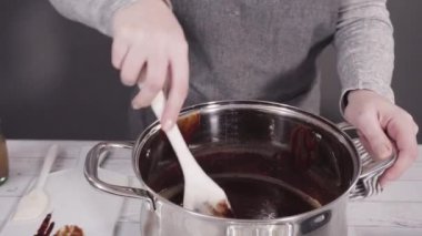 Mixing ingredients to make simple chocolate fudge