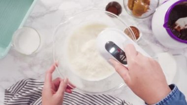 Making homemade chocolate chip ice cream