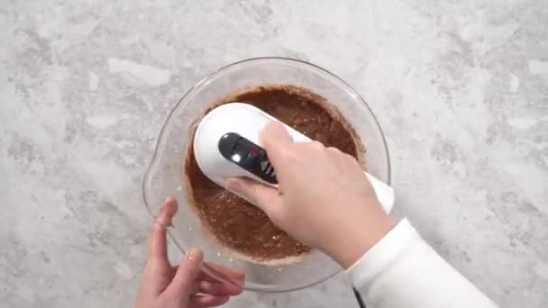 Making Cake Batter Bake Red Velvet Bundt Cake — Stockvideo