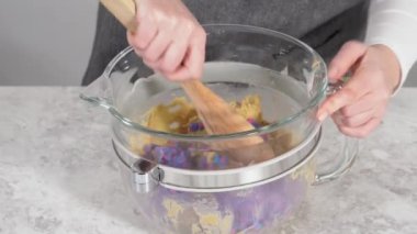 Chilled cookie dough to bake unicorn chocolate chip cookies.
