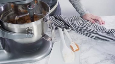 Making peanut butter cookies.