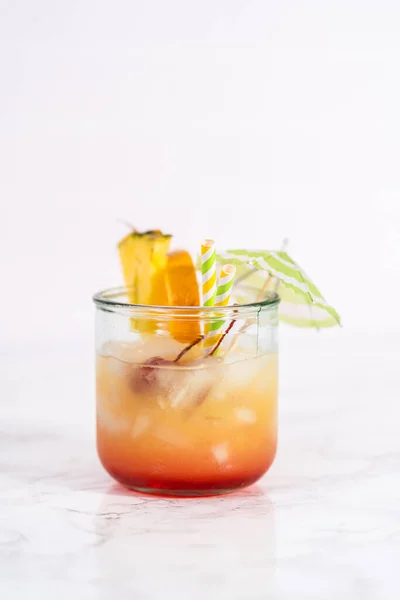 Freshly Made Sunset Cocktail Garnished Slice Fresh Orange Pineapple — стоковое фото