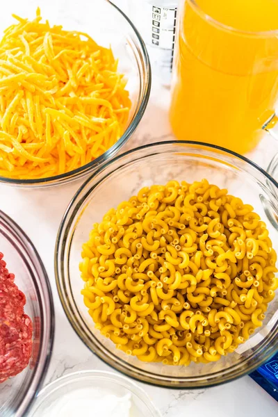 Measured Ingredients Glass Mixing Bowls Make Homemade Hamburger Helper — Stock Photo, Image