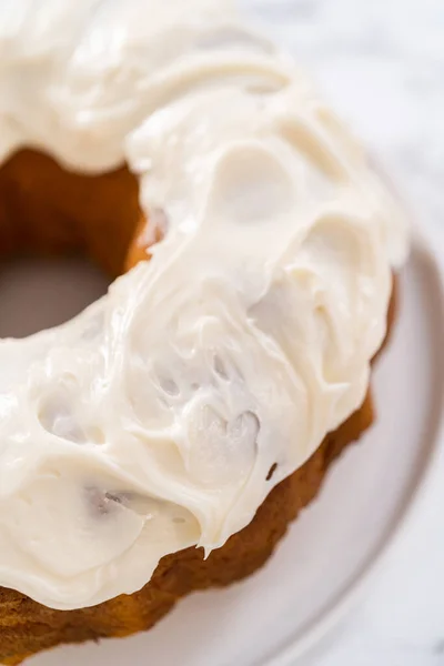 Freshly Baked Pumpkin Bunt Cake Cream Cheese Frosting Kitchen Counter — Stock Photo, Image