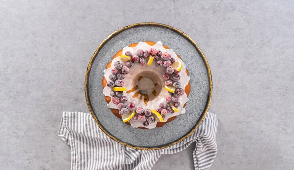 Flat Lay Lemon Cranberry Bundt Cake Decorated Sugar Cranberries Lemon — Stock Photo, Image