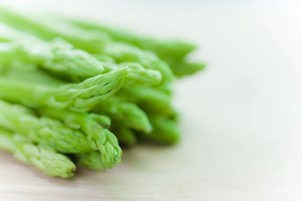 Selective focusing asparagus on white — Stock Photo, Image