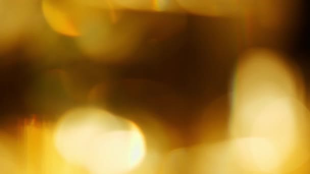 Guld gul bokeh partiklar bakgrund — Stockvideo