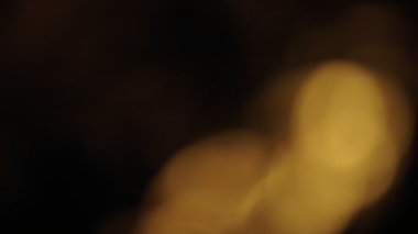 Kırmızı ışık soyut arka plan bokeh sinematik duvar kağıdı. Siyah arkaplan