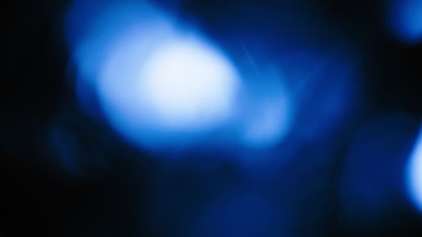 Niebieskie światło przecieka z blaknącym efektem z rozbłysku obiektywu Illuminate Collection — Wideo stockowe
