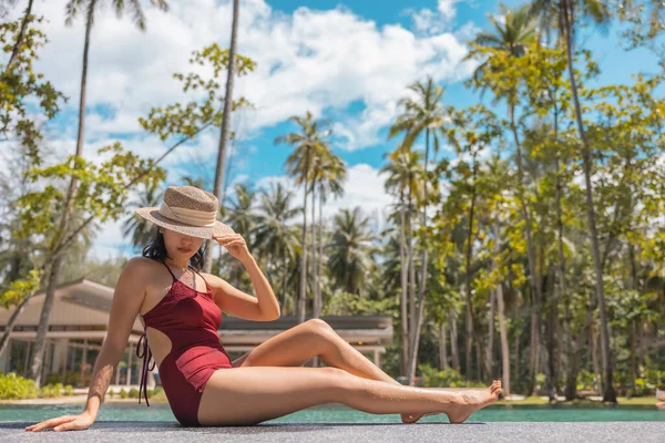Happy Asian Woman Red Swimsuit Straw Hat Relaxing Sit Pool — Stock Photo, Image