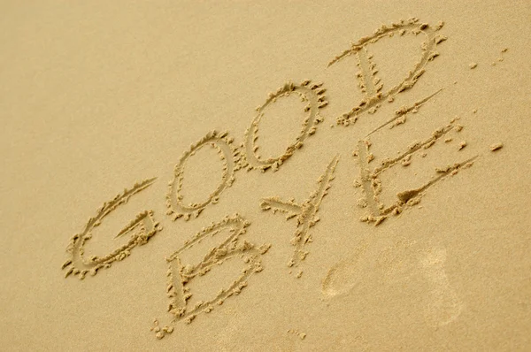 Good bye written in the sand