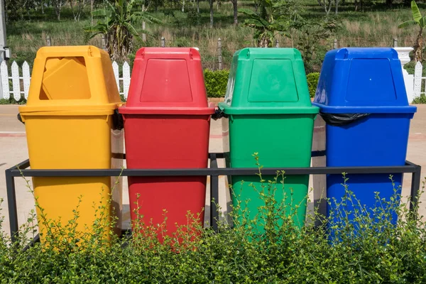 stock image Multicolours recycle bin setting at the public park. A container used to hold recyclables before they are taken to recycling centre.