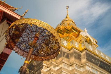 The beautiful golden pagoda of Wat Phra That Doi Saket on the small hill in Doi Saket district of Chiang Mai, Thailand.