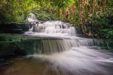 The beautiful landscape of Mun Daeng waterfalls in rainforest of Phu Hin Rong Kla national park, Phitsanulok province of Thailand.