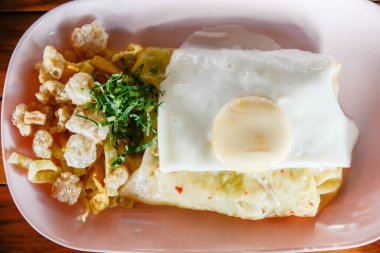 Close-up of Khao Pun Phak and iconic and local unique food of Laplae district in Uttaradit province of Thailand. (Steamed vegetables and minced meat wrapped in rice flour skin)