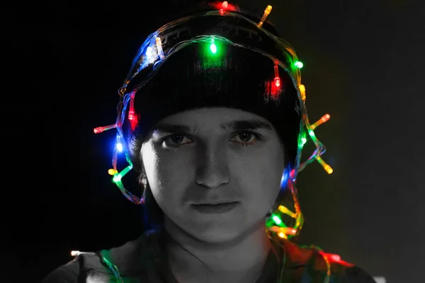 Close Portrait Sad Tired Young Woman Festive Lights Her Head — Stock Photo, Image