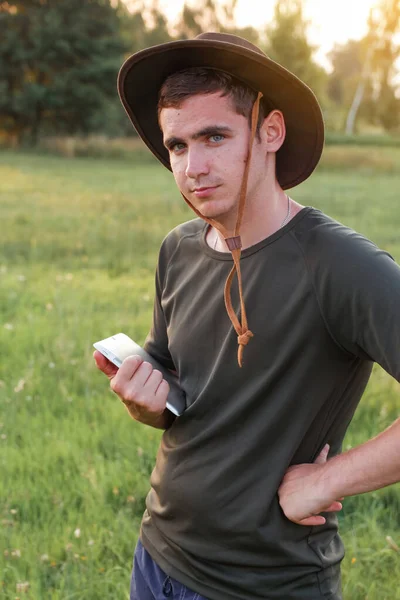 Young Man Farmer Cowboy Hat Agricultural Field Sunset Holding Tablet — Fotografia de Stock