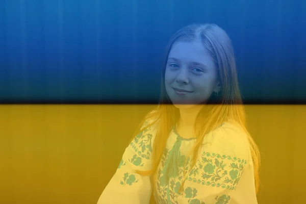 Ukraine child. Ukrainian teen girl in vyshyvanka. Pray for Ukraine. praying for peace. Happy kid celebrating Independence Day. Victory in war. Hope concept. Portrait closeup. Flag background — Stock Photo, Image
