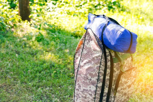 Defocus Military Backpack Blue Tent Sleeping Bag Army Bag Green Stock Photo