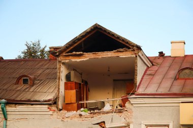 Defocus huge ruins, wreck in Ukraine, war. House after russian attack. Ruined home background. Kyiv home. Close-up. Russian terrorism. Out of focus.