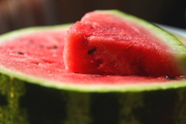 Defocus bright watermelon. Close-up of fresh slice red watermelon. Slices of water melon. Ukraine, Kherson. Out of focus.