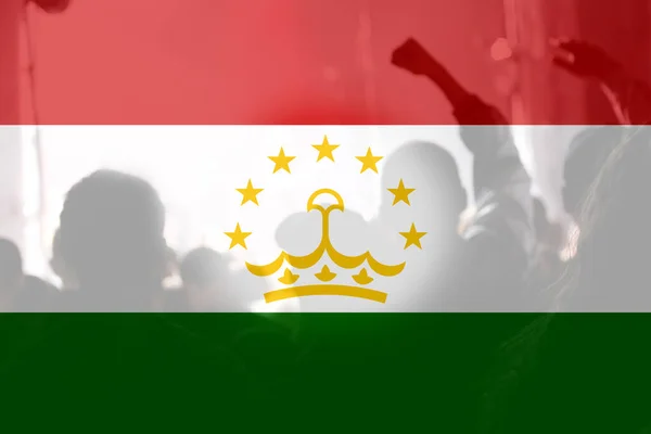 Defocus protest in Tajikistan. Conflict war between Kyrgyzstan and Tajikistan over border. Conflict. Country flag. Out of focus.