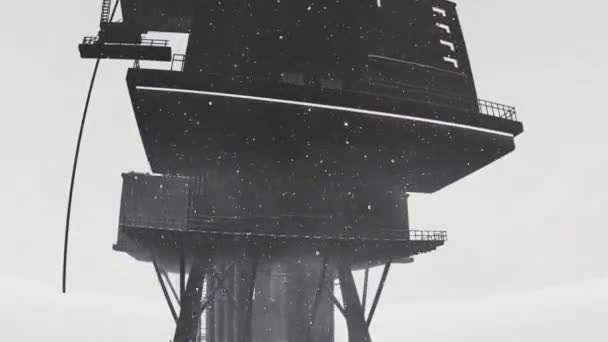 Oil rig platform standing in frozen sea — Stock Video