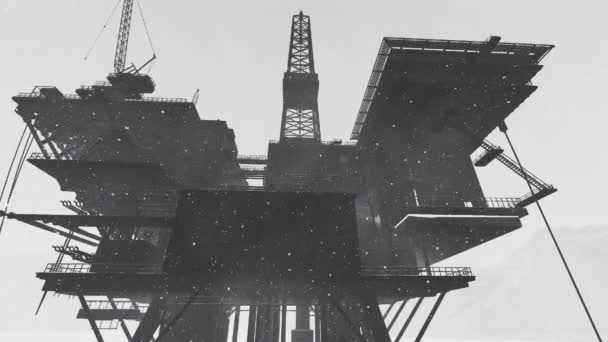 Oil rig platform standing in frozen sea — Stock Video