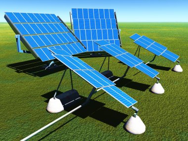 Yeşil çimenlerin üzerinde güneş panelleri