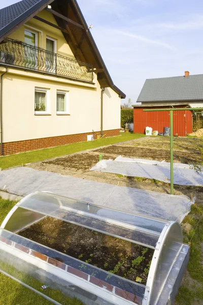 Small greenhouse in garden — Stock Photo, Image