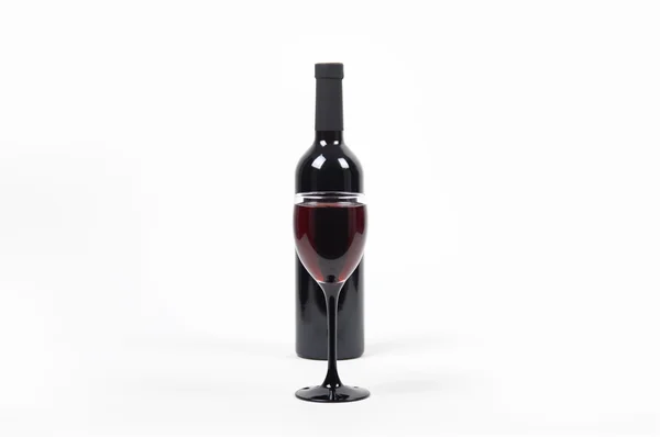 Bottle of red wine with a glass — Stock Photo, Image