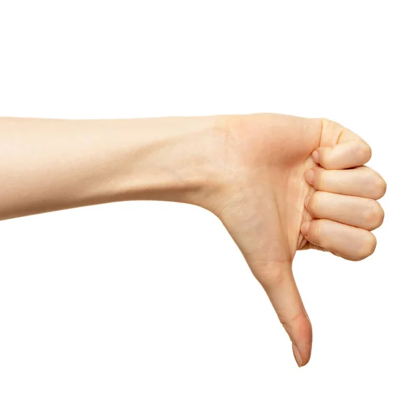 Hand show dislike or negative isolated on white. Female thumb show sign disapproval or unlike closeup. Women palm finger demonstrated down — Stock Photo, Image