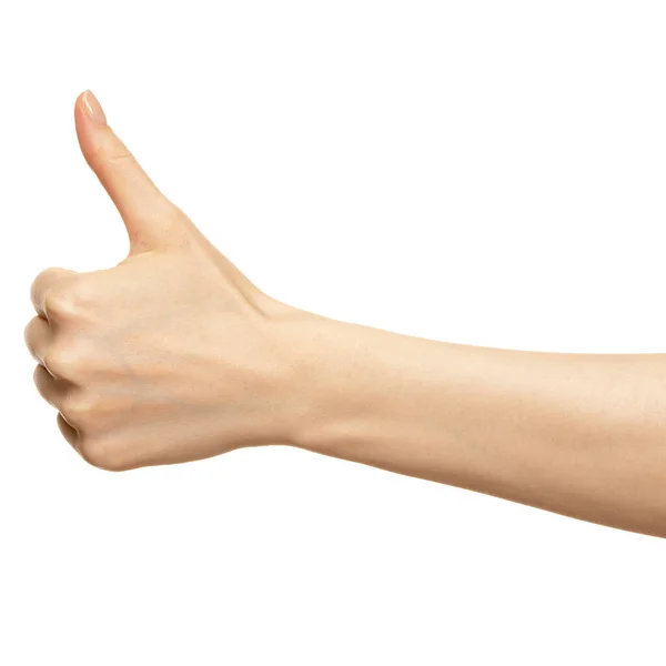Kvinnlig hand visar tummen ok eller bra isolerad på vitt. Finger show tecken som eller cool närbild Stockbild