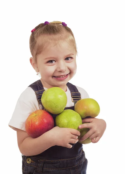 La niña juega con manzanas — Foto de Stock