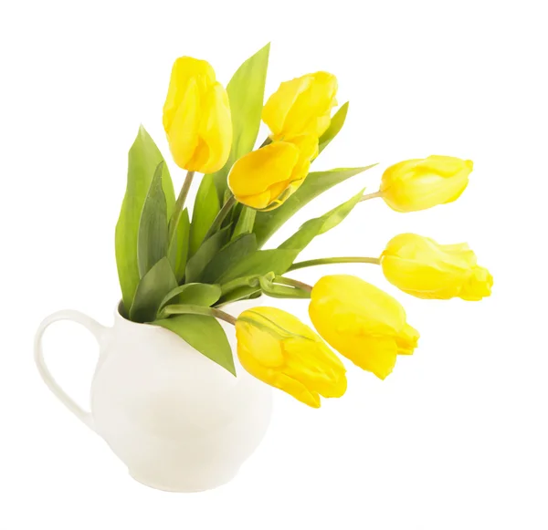 Žluté tulipány ve džbánu — Stock fotografie