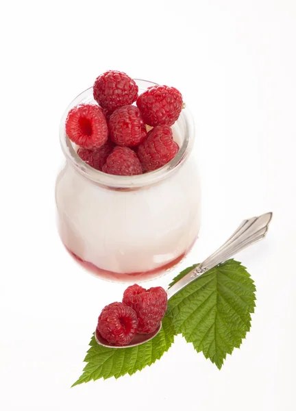 Fresh Yogurt in a jar with Raspberries, leaves — Stock Photo, Image