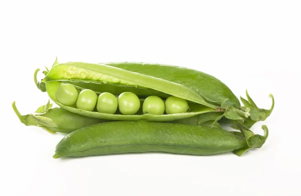 Groene erwten in stryuchka — Stockfoto