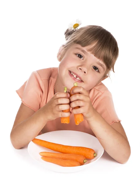 Menina bonito com a cenoura — Fotografia de Stock