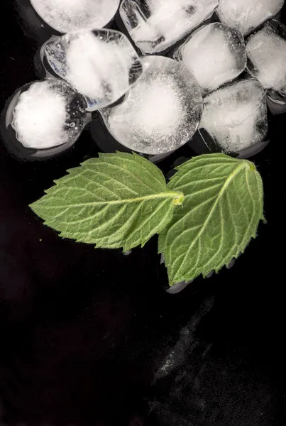 Ice cubes isolated on black — Stock Photo, Image